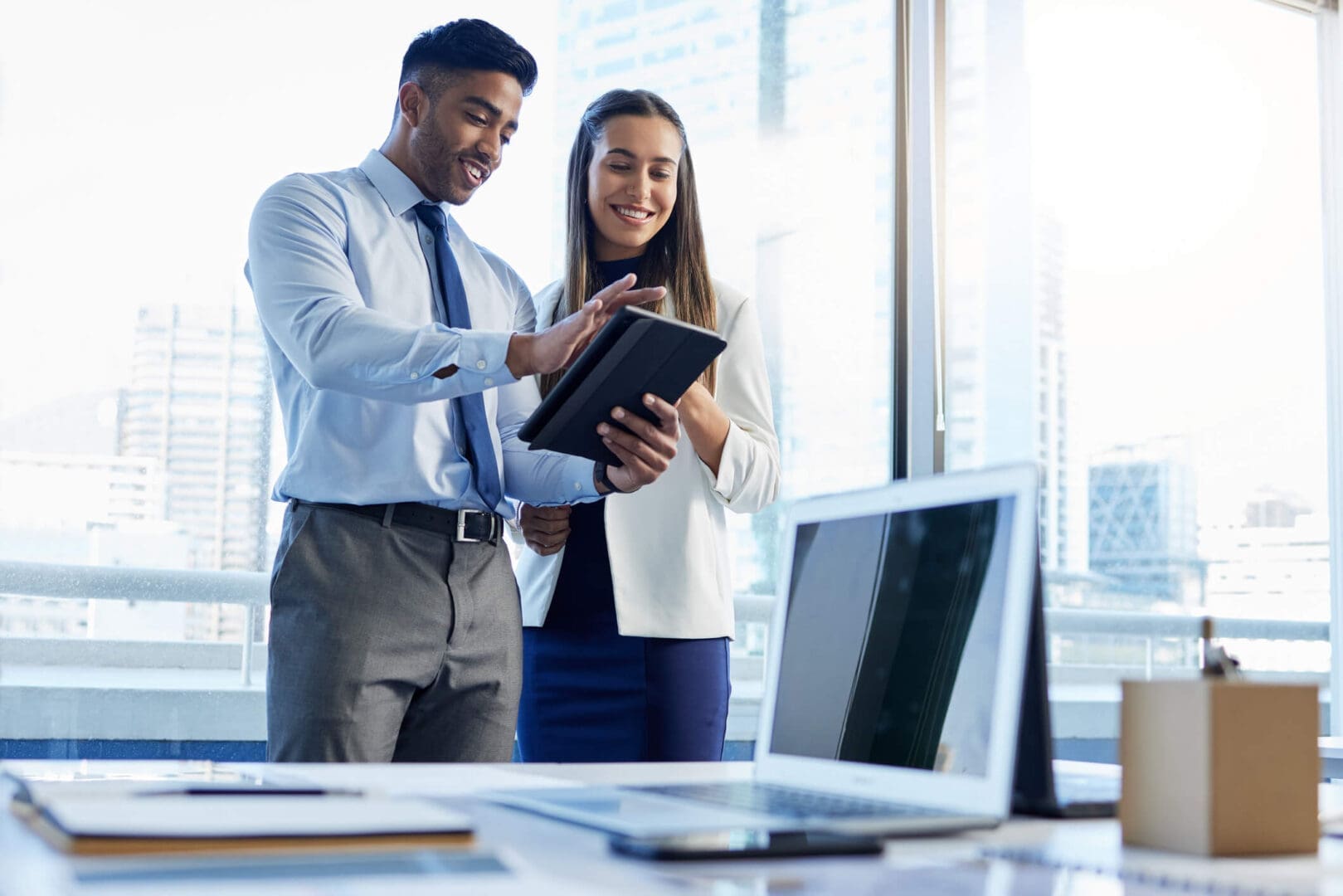 shot-of-two-businesspeople-discussing-something-1619x1080